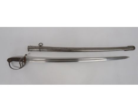 Late 19th Century Toledo Made Contract Cavalry Sword33 3/4 inch, single edged, slightly curved blade with large fuller.  The 