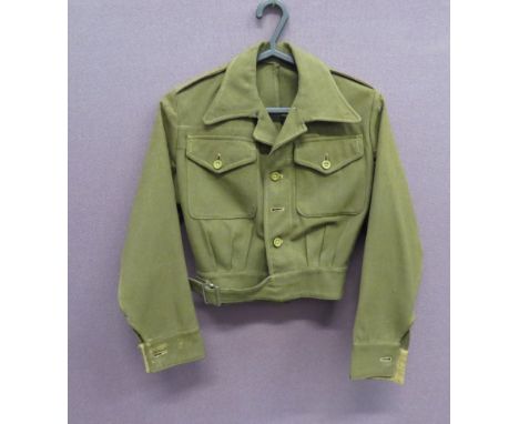 WW2 Pattern ATS Battle Dress Jacketkhaki, woollen, single breasted, short tunic.  Patch chest pockets with buttoned flaps.  L