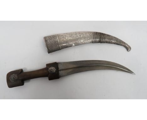 Albanian/Balkans Horn Hilted Jambiya9 3/4 inch, slightly curved, double edged, Damascus blade with central rib. Carved one pi