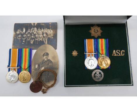 Two WW1 Medal Pairs To MGC and ASCconsisting silver War medal and Victory medal named to "55479 Pte J E Beesley MGC". Togethe