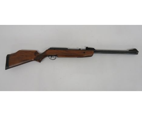 BSA Air Rifle.22, 18 1/2 inch, blackened barrel with front blade and rear adjustable sight.  Swivel open loading gate.  Black