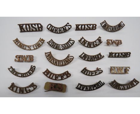 Selection of Infantry Shoulder Titles brass examples include Kings Own ... Liverpool ... Kings ... The Buffs ... Buffs ... Qu