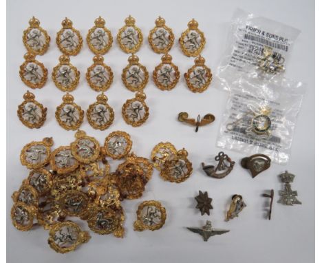 Quantity of WRAC Cap Badges39 x KC bi-metal WRAC cap badges. Together with a small number of various collar badges including 