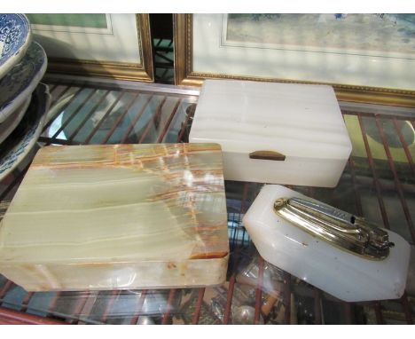 Two cigarette boxes in onyx and alabaster, together with an alabaster Ronson table lighter (3)