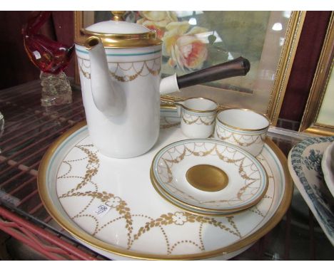 A Royal Copenhagen white ground and gilt part coffee set comprising tray, coffee pot, cream jug, cup and two saucers 