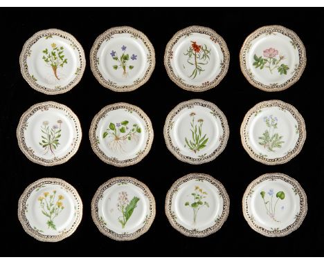 Royal Copenhagen, Denmark. Set of twelve Flora Danica botanical porcelain reticulated luncheon plates, shape number 20 3554. 