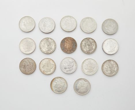 Group of 17 Morgan silver dollars from 1882-1884 including: two 1882 P, four 1882 O, one 1882 S, four 1883 O, four 1884 P, on