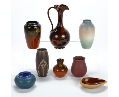 Rookwood Pottery, Ohio, USA. Group of eight Arts &amp; Crafts pottery pieces dating from 1905 to 1919.Includes one dark red v