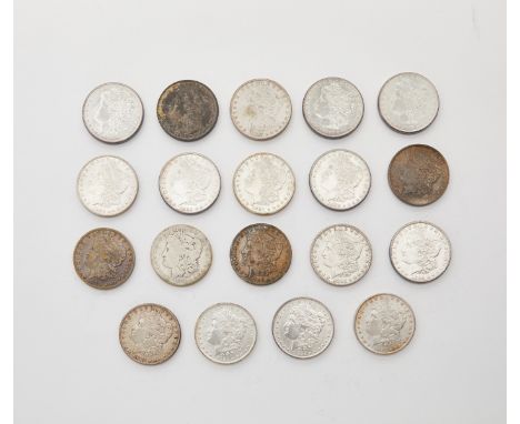 Group of 19 Morgan silver dollars dating from 1885-1887 including: three 1885 P, three 1885 O, four 1886 P, three 1886 O, and