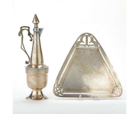 Two pieces of sterling silver Russian aesthetic movement serving ware. One pitcher with a tall, thin neck and art nouveau sty