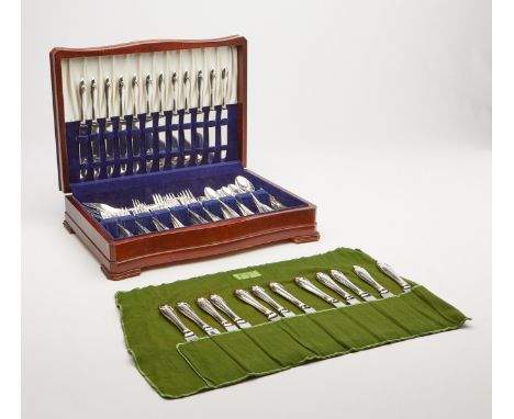 Gorham hand hammered sterling silver flatware set. This set includes: 12 dinner knives, 12 dinner forks, 12 luncheon knives, 