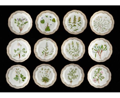 Royal Copenhagen, Denmark. Set of twelve Flora Danica botanical porcelain reticulated dinner plates, shape number 20 3526. Ea