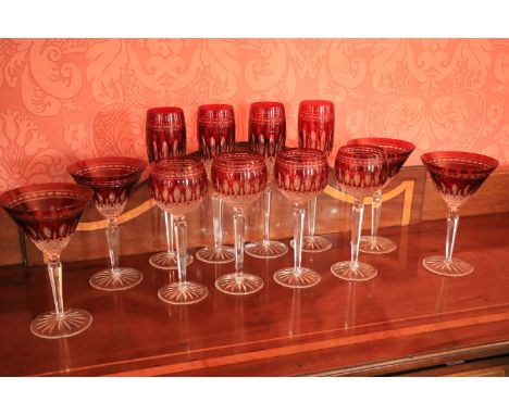 A good set of 12 Waterford crystal Glasses, comprising 4 ruby hock Glasses, 4 ruby Champagne Flutes and 4 matching Cocktail G