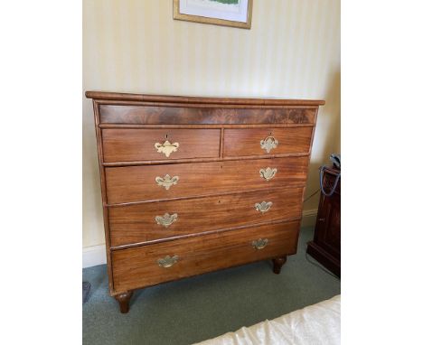 A 19th Century mahogany Scotch Chest, with three long and two short drawers under a concealed frieze drawer on turned legs, 4
