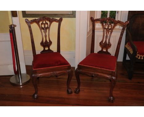 A set of 8 Chippendale style mahogany Dining Chairs, each with pierced vase shaped splat on front leaf carved cabriole legs w