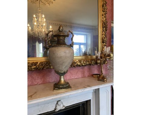 A large heavy Neo-Classical style marble and brass mounted Urn and Cover, with pineapple finial and two serpent mounted handl
