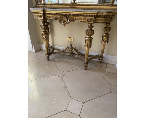 A 19th Century French gilt and gesso Console Table, with inverted breakfront white marble top, the fluted frieze with oval pa