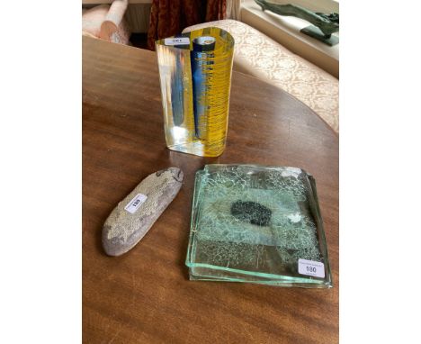 A small heavy Art Glass Candlestick, a square green Art Glass three layer Panel, and a fish form Stone with natural scales. (