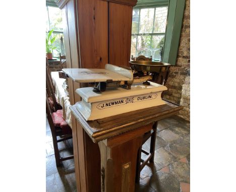 A heavy ceramic Shop Counter Scales, by J. Newman, Dublin with copper weight pan, 21'' (53cms). (1) 