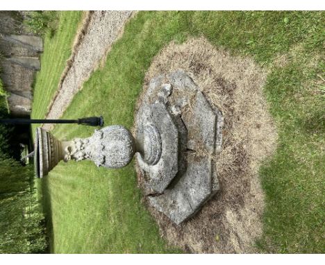 An attractive composition&nbsp;bulbous shaped Sundial, the circular lead dial over a main body decorated with flowers and fru