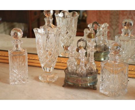 A Waterford crystal Vase, 10'' (25cms), together with two similar square glass Decanters and a circular silver plated Cruet S