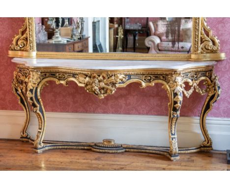 A very fine 19th Century gilt and ebonised Console Table, of serpentine form with white marble top, the frieze with various t