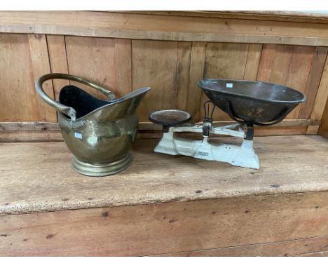 An old Avery cast iron and enamel Shop Scales, with copper pan and four weights, 24'' (61cms); together with a brass Coal Hel