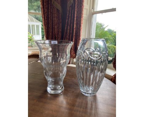 A fine large Waterford crystal Vase, with fluted body, 13'' (33cms) and another heavy glass Vase (slight chip). (2) 