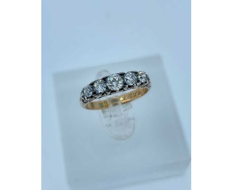 18CT GOLD FIVE STONE DIAMOND RING, the five graduated stone totalling 0.5cts approx., engraved 'From H.E.S. to A.E.P 11/02/07