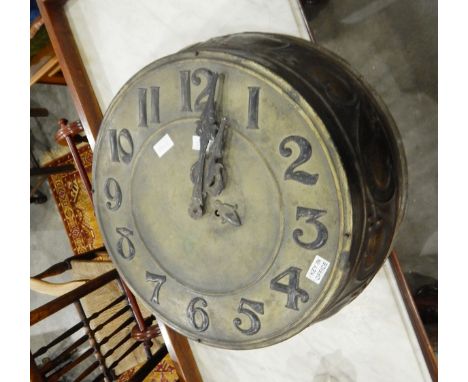 An Art Nouveau copper and brass wall clock with Arabic numerals, embossed floral decoration to edge, Swinden & Sons, Birmingh
