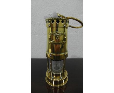 A Thomas & Williams Limited, Cambrian brass miners lamp, with certificate 