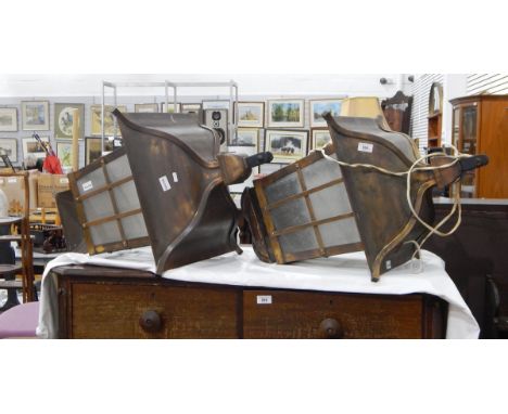 A pair of oxidised metal lantern lights and a pair of iron brackets 