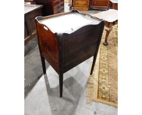 A Georgian mahogany converted tray top commode, the cupboard with tambour sliding front, and a further drawer below, on squar