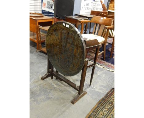 A small mahogany side table with gallery and under-shelf, 39cm wide and a hardwood tilt-top table with carved Oriental scene 