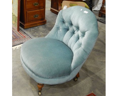 A small nursing chair, with button back and upholstered seat