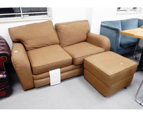 A 21st century two seater sofa with brown fabric weave and a matching footstool (2) 