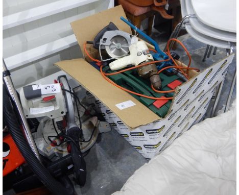 A compound mitre saw, electric drills, sander, tools, etc. 