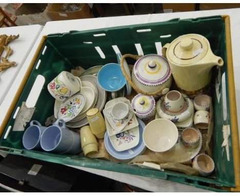 A quantity of Poole including biscuit barrel, egg cups, dishes, cups and saucers, etc. (1 box) 