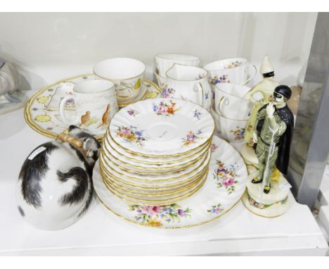 A porcelain model of a sleeping cat, a Royal Worcester 'Roanoke' pattern tea set comprising six cups and saucers, side plates