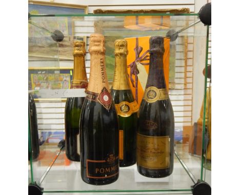 A bottle of Veuve Clicquot Ponsardin champagne (boxed), another (unboxed), another Veuve Clicquot vintage 1988 (unboxed), a b