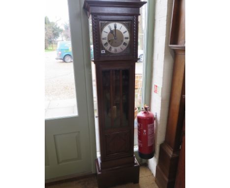 A 1930's three train longcase clock Westminster  chimes exposed pendulum - Height 181cms