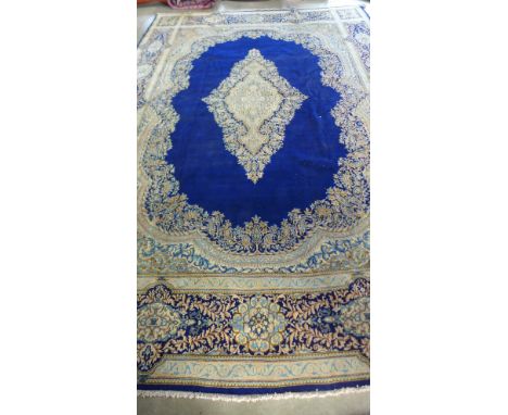 A handmade Kerman carpet of South Central Persian origin - 435cm x 297cm 