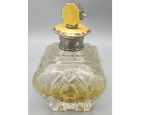 20th century cut crystal square tapered dressing table perfume bottle with silver and yellow guilloche enamel lid, by Adie Br