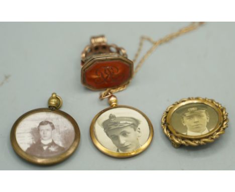 9ct yellow gold double sided portrait pendant on 9ct gold chain with barrel closure, 4.97g a yellow metal intaglio initial fo