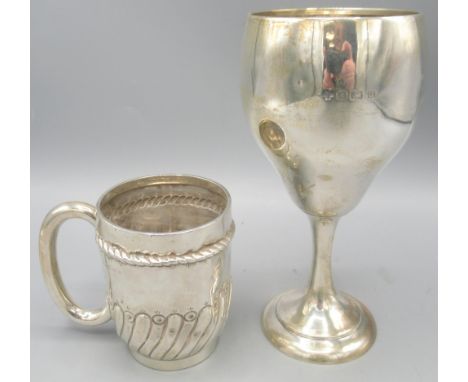 George V silver goblet by William Hutton & Sons, Birmingham 1919, and a George V silver christening mug with embossed pattern
