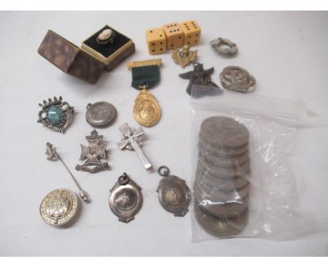 Two hallmarked silver fobs, a silver cross brooch, a silver South Africa Queen Victoria cap badge, a silver locket pendant en