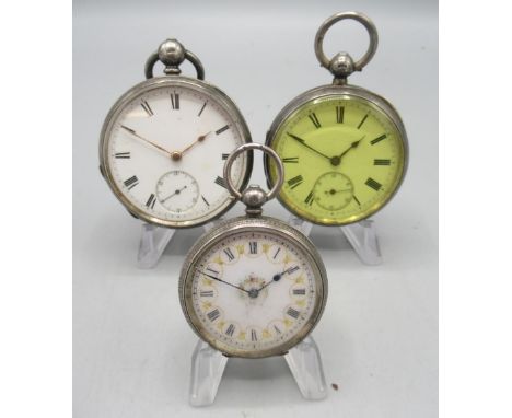 Waltham retailed by Wm. Ellery, silver key wound pocket watch, white enamel Roman dial with subsidiary seconds, engraved coin