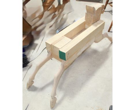 Partially constructed modern rocking horse, including legs with uncarved torso and head. Height excluding head 49cmPOA  https