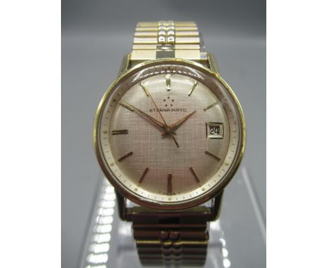 Eterna, Eterna-Matic stainless steel and gold plated automatic wristwatch with date, signed linen textured silvered dial with
