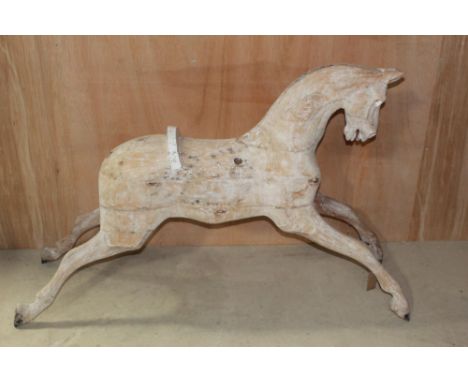 Medium size Lines rocking horse C1910. Restoration project stripped down to wood with some areas filled. Lacking rockers, tac